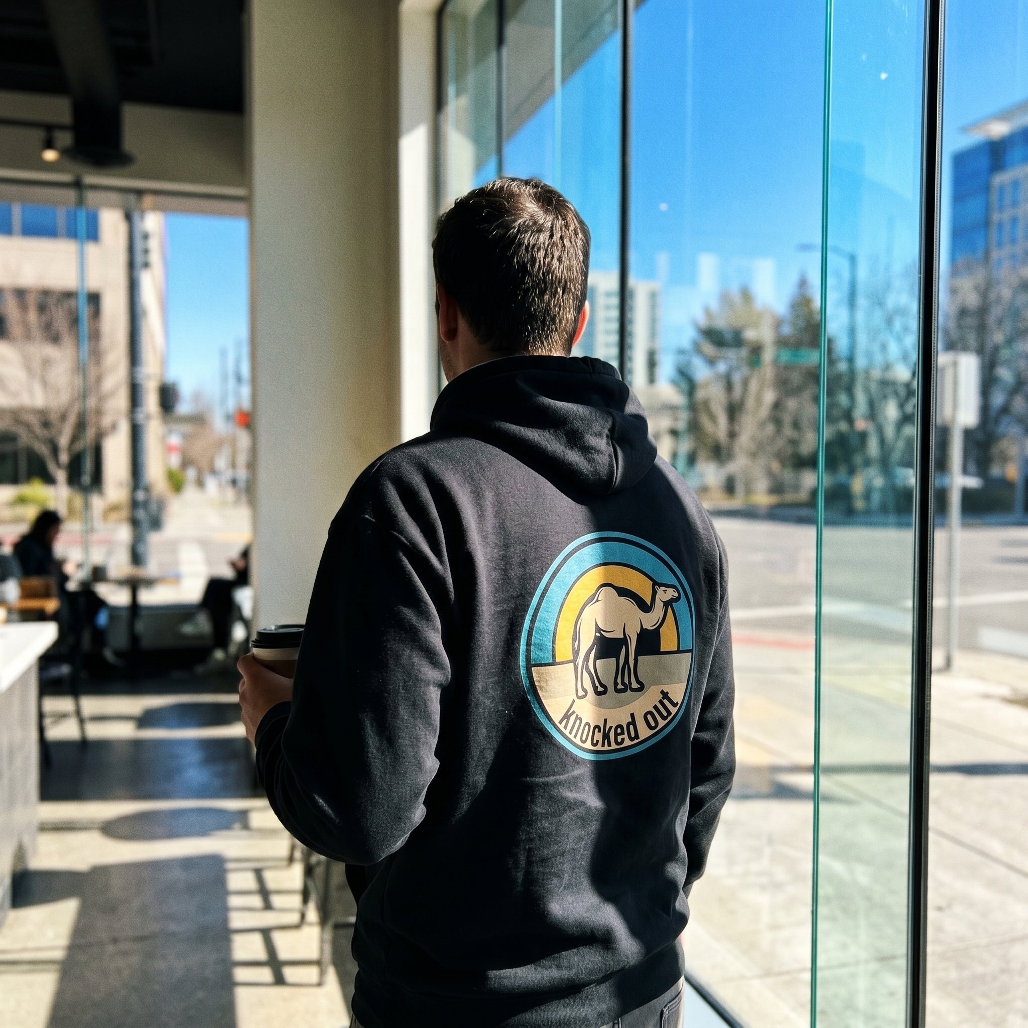 Mens Knocked Out Hoodie - Retro Circular Badge Graphic