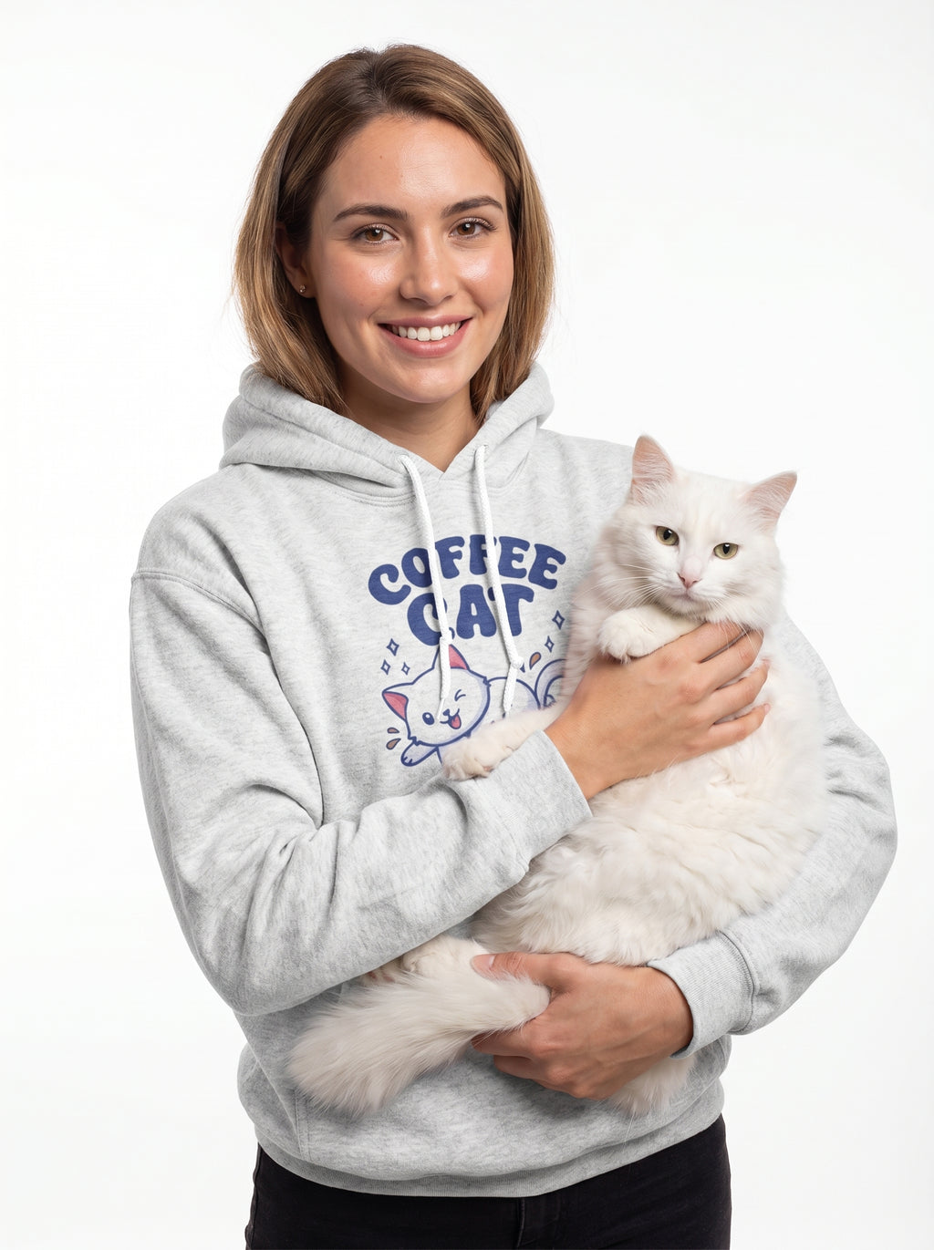Woman wearing a gray hoodie with 'Coffee Cat' design, holding a white cat on a white background