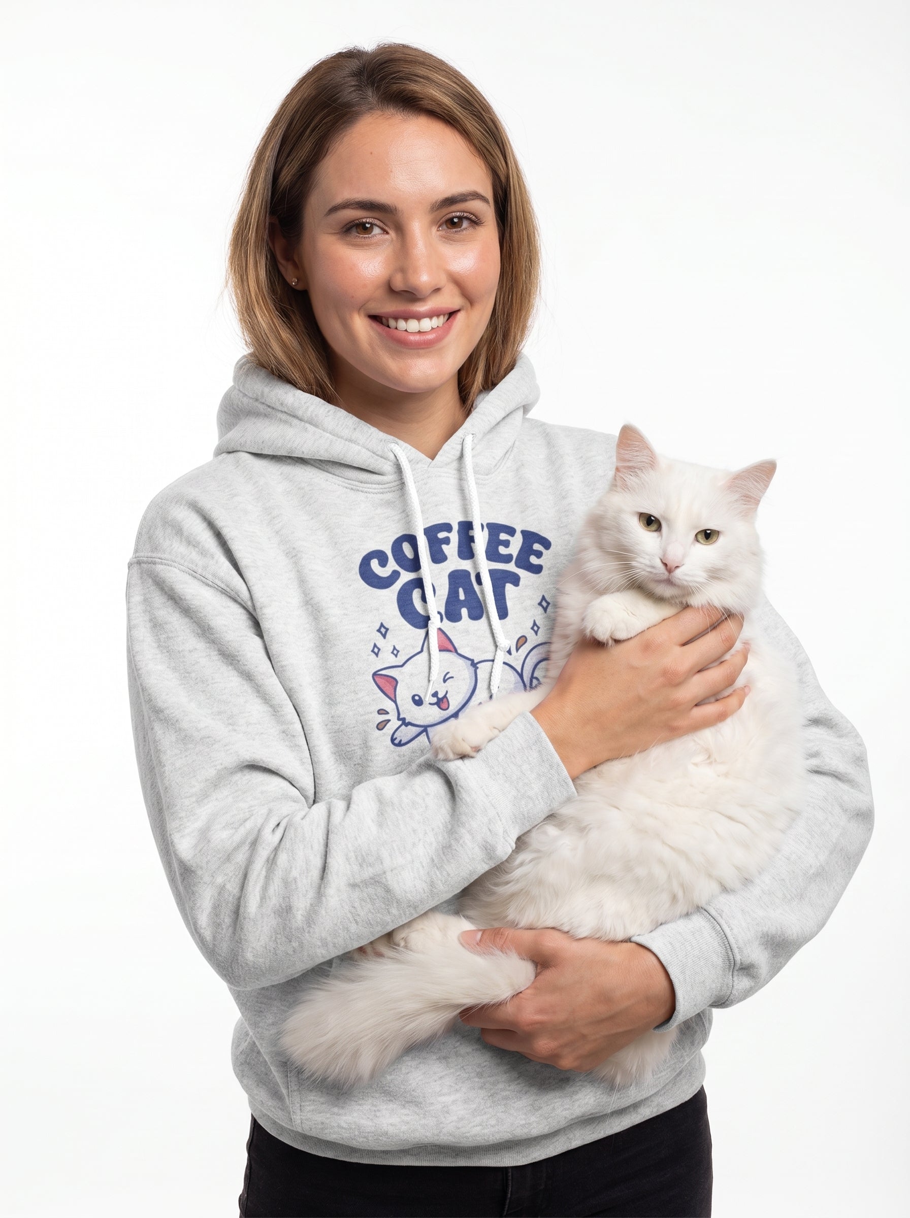 Woman wearing a gray hoodie with 'Coffee Cat' design, holding a white cat on a white background